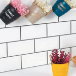 Γλαστράκι πλαστικό με λουλούδια 15cm [87328001504]